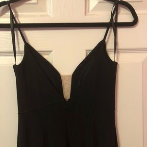 Black scoop-neck sleeveless dress